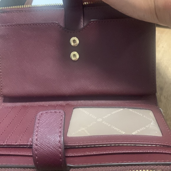 Safiano Leather wine Michael Kors Leather Phone Wristlet. Removable holder - Picture 2 of 6